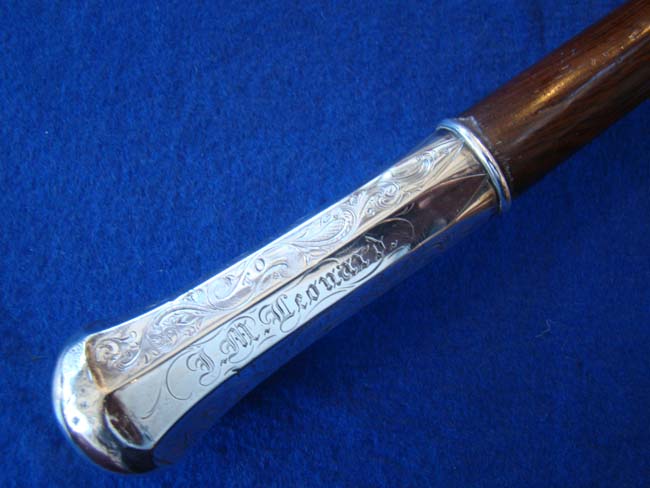 A fabulous 19th century silver mounted presentation walking stick dated Jan. 2, 1860 with rosewood shaft 